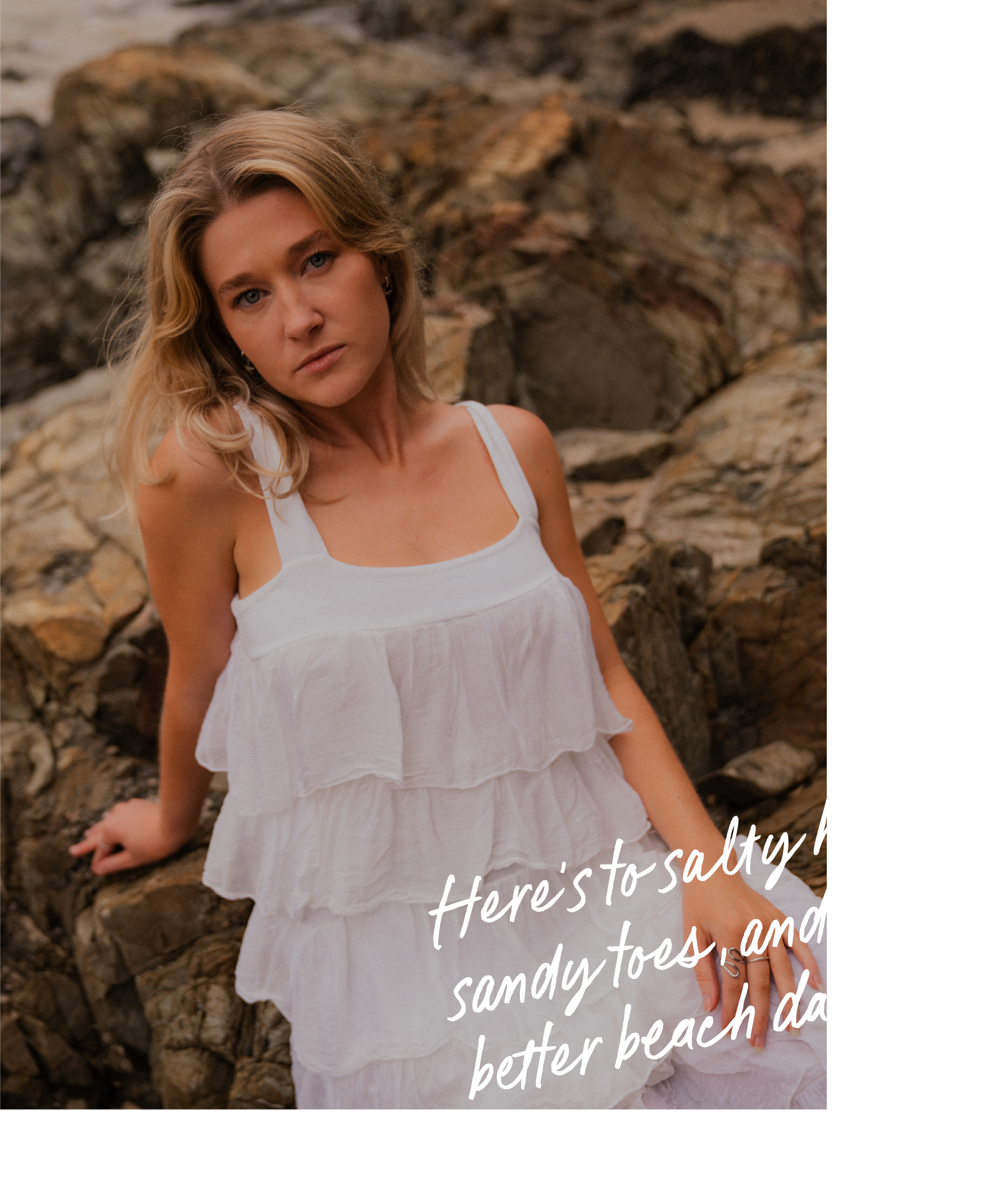 Victoria sitting on a rock