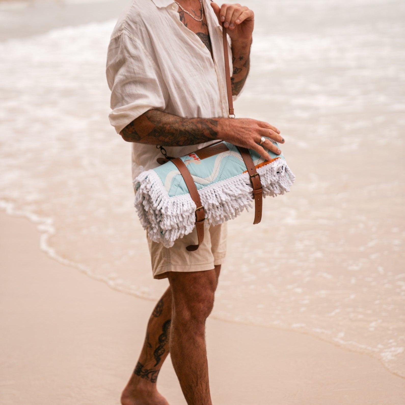 Beach picnic fun on a colorful beach blanket, perfect picnic blanket for sandy snack attacks!