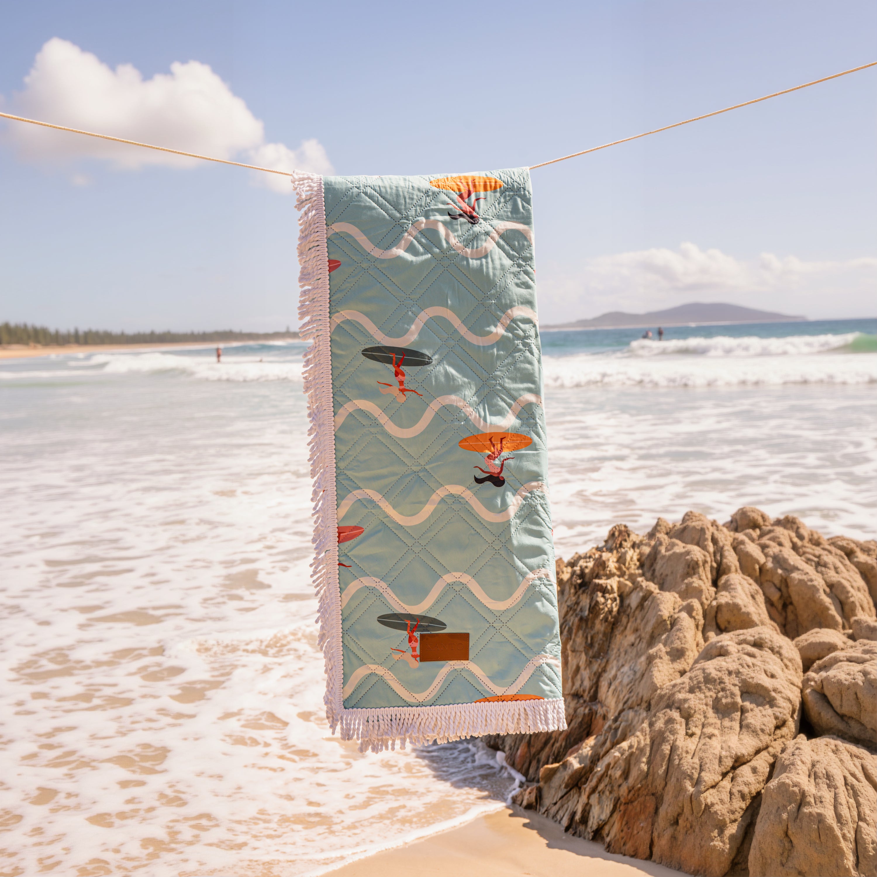 Beach picnic fun on a colorful beach blanket, perfect picnic blanket for sandy snack attacks!