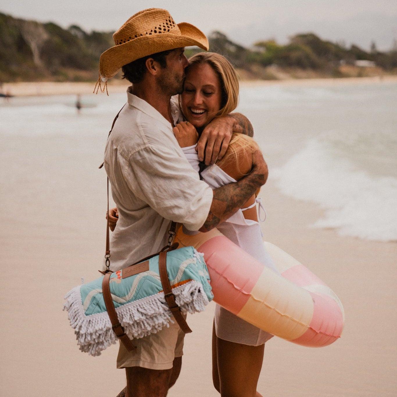 Beach picnic fun on a colorful beach blanket, perfect picnic blanket for sandy snack attacks!